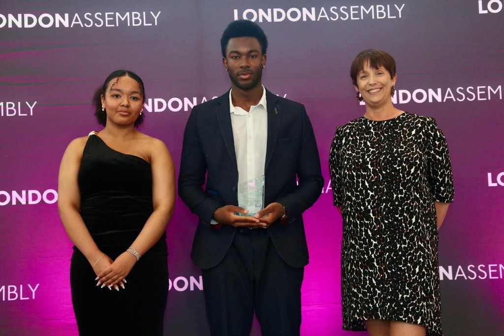 Lenon Muma receiving the Young Leader Award at the London Youth Achievement Awards